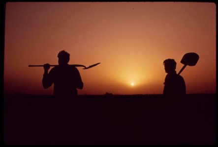 Farm-workers-shoulder-tools-at-end-of-day-near-ripley-in-the-fertile-palo-verde-valley-of-the-lower-colorado-river-region-may-1972 6990268118 o photo