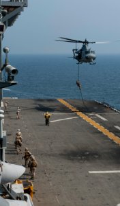 Fast roping from a UH-1Y Venom helicopter 140328-N-LM312-072