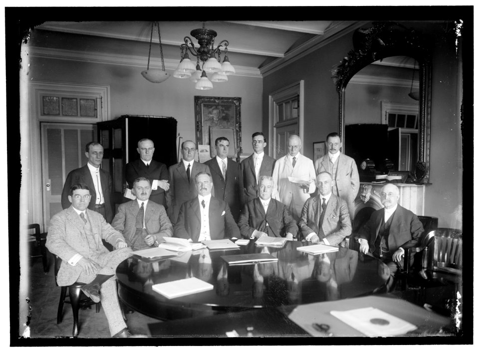 FEDERAL BANK EXAMINERS. SITTING- J.D. BRENNAN; P.M. KERST; JOHN SKELTON WILLIAMS, COMPTROLLER OF TREASURY; T.P. KANE; J.D. RISING; E.I. JOHNSON. STANDING- C.H. ABBOTT; J.C. CHIDSEY; C.E. LCCN2016866520