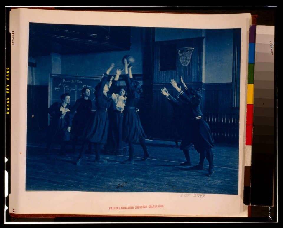 Female students playing basketball in a gymnasium, Western High School, Washington, D.C. LCCN2002695166