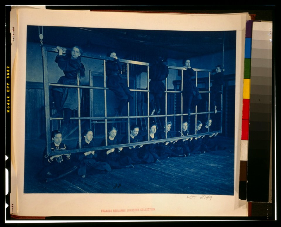 Female students posing with exercise equipment in a gymnasium, Western High School, Washington, D.C. LCCN2002695165