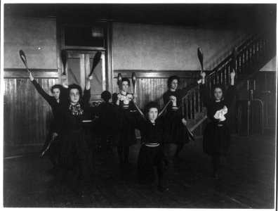 Female students exercising with bowling pins, Western High School, Washington, D.C. LCCN2001699135