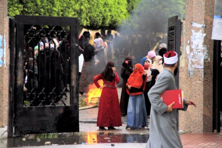 Female students burn debris - protest at Al-Azhar University Cairo 11-Dec-2013