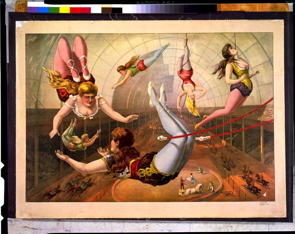Female acrobats on trapezes at circus LCCN93500071