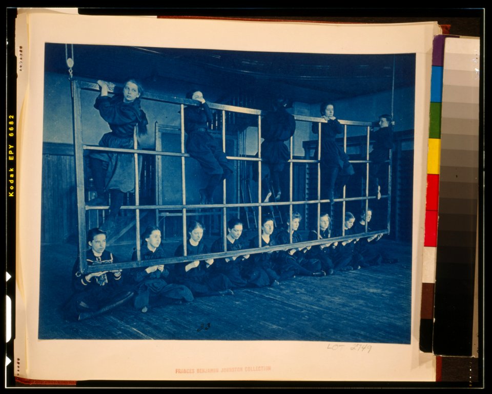 Female students posing with exercise equipment in a gymnasium, Western High School, Washington, D.C. LCCN2002695165