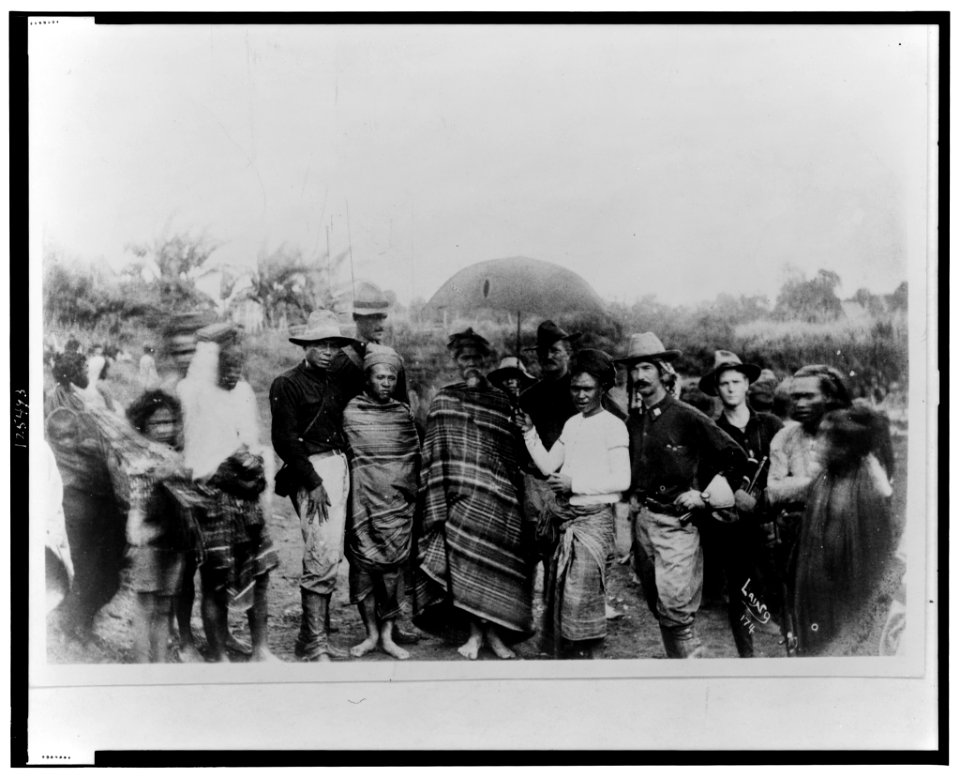 Fernandez, interpreter; newspaper man, Gen. Pershing, Capt. James A. Ryan, and others posed at Iligan, Philippine Islands LCCN00649552