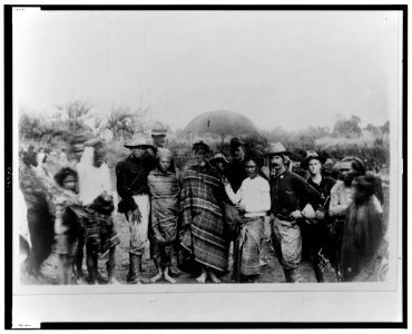 Fernandez, interpreter; newspaper man, Gen. Pershing, Capt. James A. Ryan, and others posed at Iligan, Philippine Islands LCCN00649552