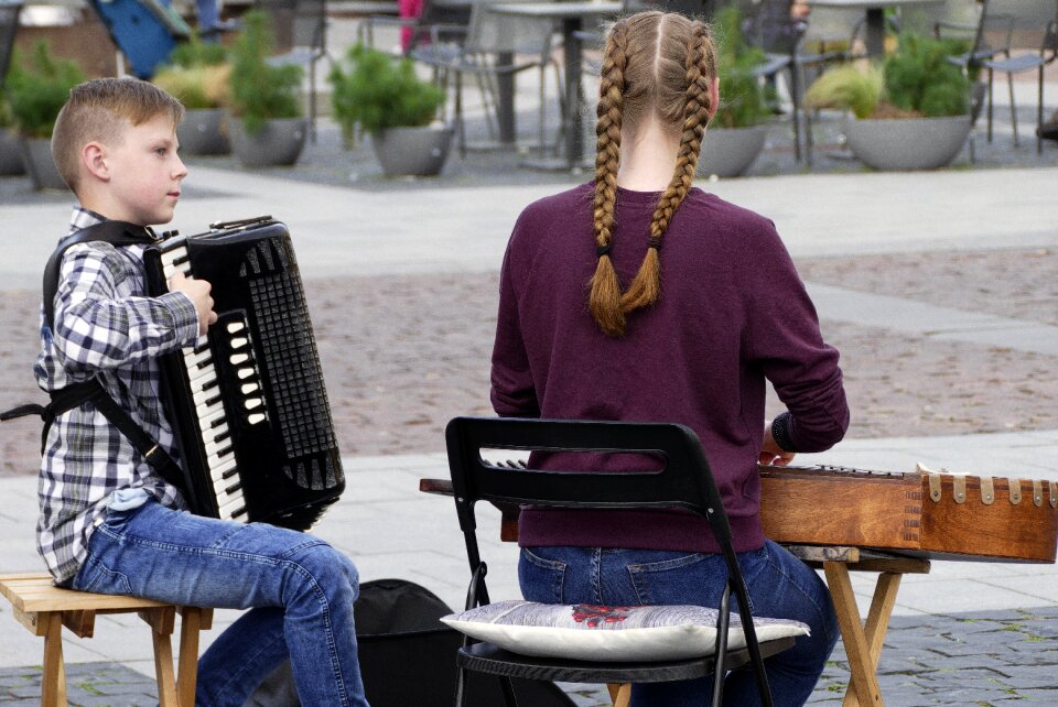 Young people accordion keyboard instrument