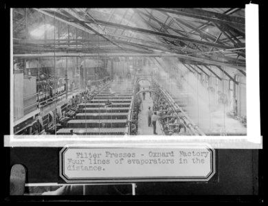 Filter presses, Oxnard, (California), factory, four lines of evaporators in the distance LCCN2016824503