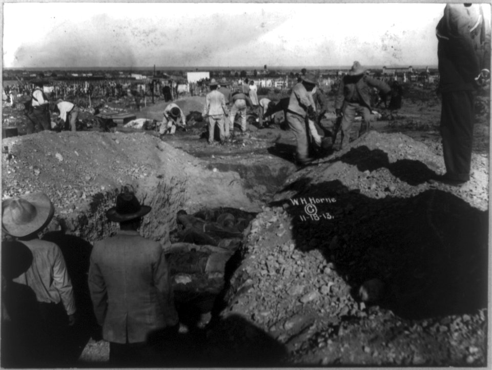 Filling the trench with dead Federals - Mexican Revolution LCCN2002718112