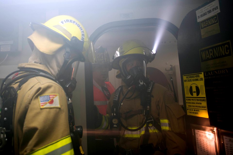 Firefighters drill aboard USS Curtis Wilbur. (8199143811)