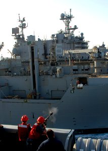 Firing a shot line 121017-N-BB534-239