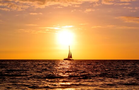 Boat water sunset photo