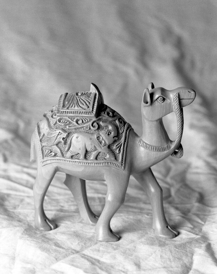 Black and white figure trinket