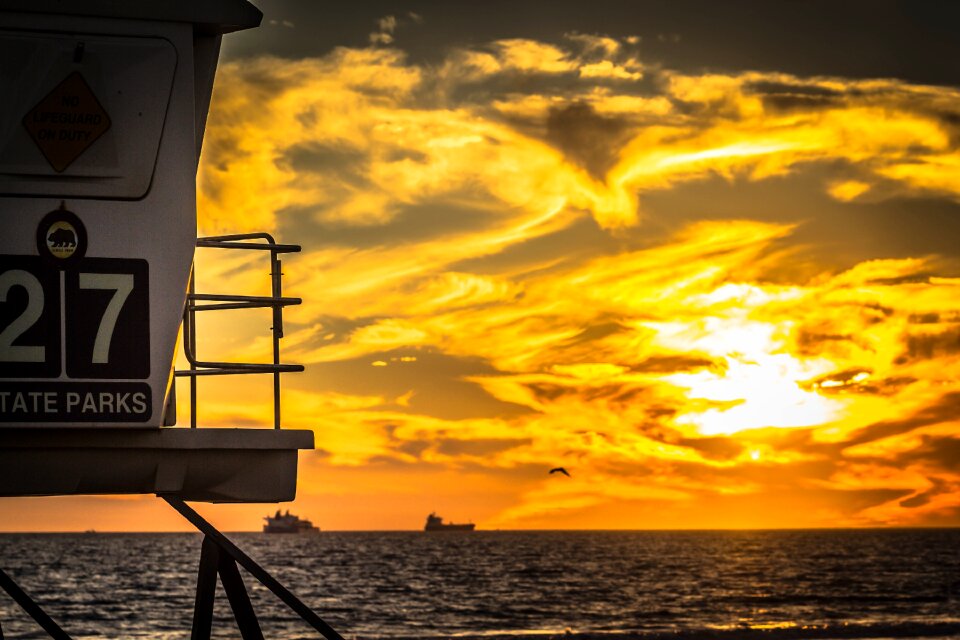 Lifeguard sea beach sunset photo