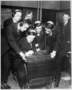 Government preparing men for radio work under direction of Federal Vocational Board. Student transmitting a message... - NARA - 533480