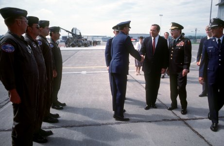 Governor Mario Cuomo is greeted by officials of the New York Air National Guard upon his arrival at Stewart International Airport