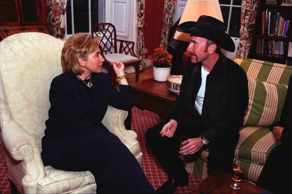 First Lady Hillary Clinton visits with musician the Edge