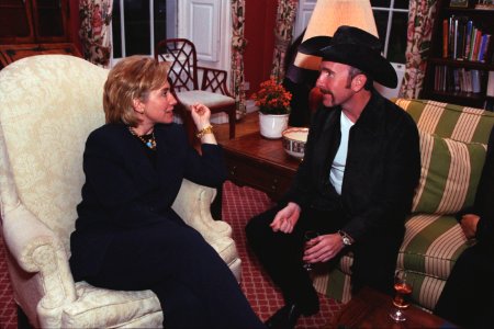 First Lady Hillary Clinton visits with musician the Edge