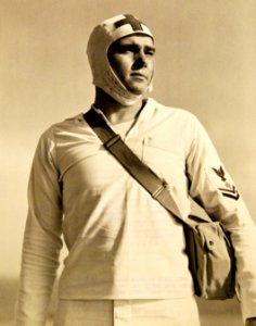 First-aid man wears distinctive helmet, assigned to the flight deck, USS Charger (ACV-30) (42447674412)