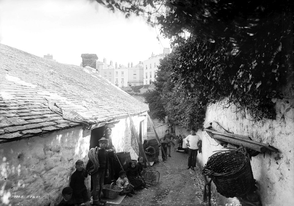 Fishermans family outside a cottage, Tenby, Pembrokeshire RMG G02602