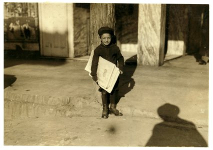 Five year old Sam is up at 5-00 A.M. daily to sell papers. Beaumont, like most other Texas towns, is overrun with boys such as these. LOC nclc.03916 photo