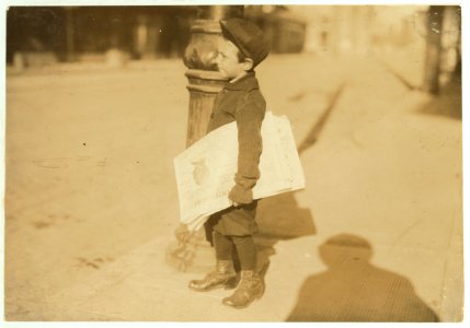 Five year old Sam is up at 5-00 A.M. daily to sell papers. Beaumont, like most other Texas towns, is overrun with boys such as these. LOC nclc.03919 photo