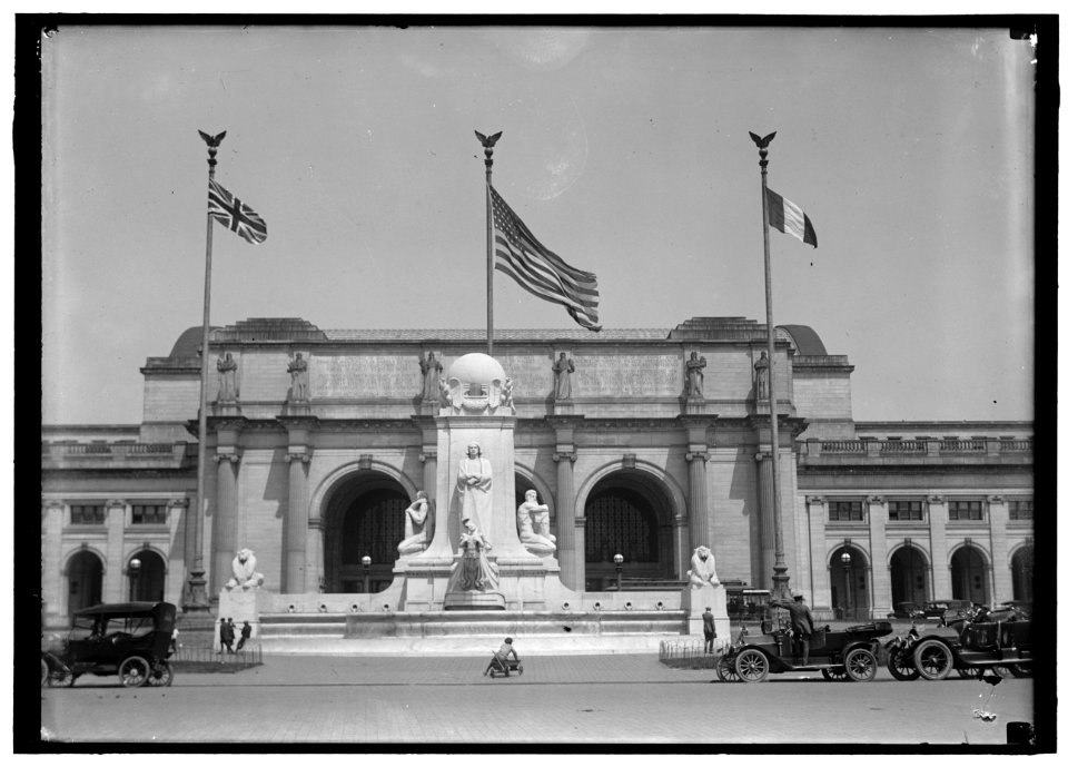 FLAGS. AMERICAN, BRITISH, AND FRENCH FLAGS IN FRONT OF UNION STATION, AWAITING ARRIVAL OF BALFOUR AND ALLIED COMMISSION LCCN2016867627