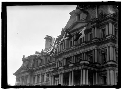 FLAGS. AMERICAN, BRITISH, AND FRENCH FLAGS ON STATE DEPARTMENT. VISIT OF ALLIED COMMISSION LCCN2016867705