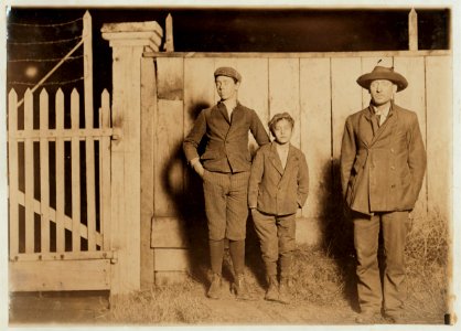 Flashlight photo of boys going home from King Mfg. Co., 6 P.M. Augusta, Ga. Smallest boy-Otis Pollard been there 2 years. Other boy been there 4 years. LOC nclc.01602