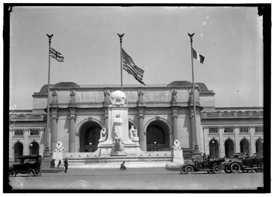 FLAGS. AMERICAN, BRITISH, AND FRENCH FLAGS IN FRONT OF UNION STATION, AWAITING ARRIVAL OF BALFOUR AND ALLIED COMMISSION LCCN2016867626