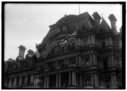 FLAGS. AMERICAN, BRITISH, AND FRENCH FLAGS ON STATE DEPARTMENT. VISIT OF ALLIED COMMISSION LCCN2016867625