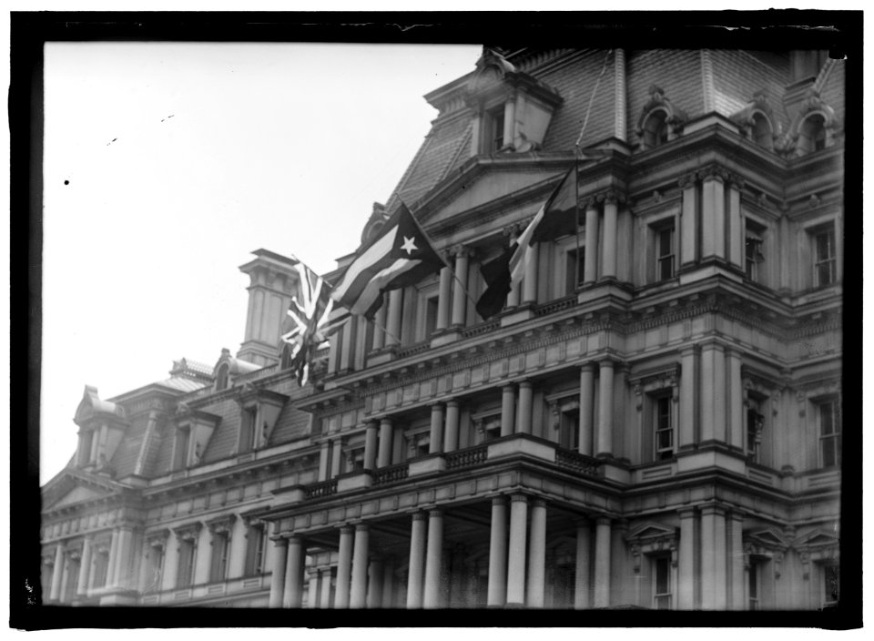 FLAGS. AMERICAN, BRITISH, AND FRENCH FLAGS ON STATE DEPARTMENT. VISIT OF ALLIED COMMISSION LCCN2016867706