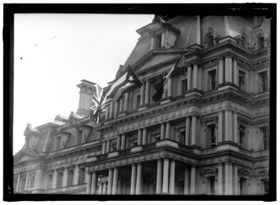 FLAGS. AMERICAN, BRITISH, AND FRENCH FLAGS ON STATE DEPARTMENT. VISIT OF ALLIED COMMISSION LCCN2016867706