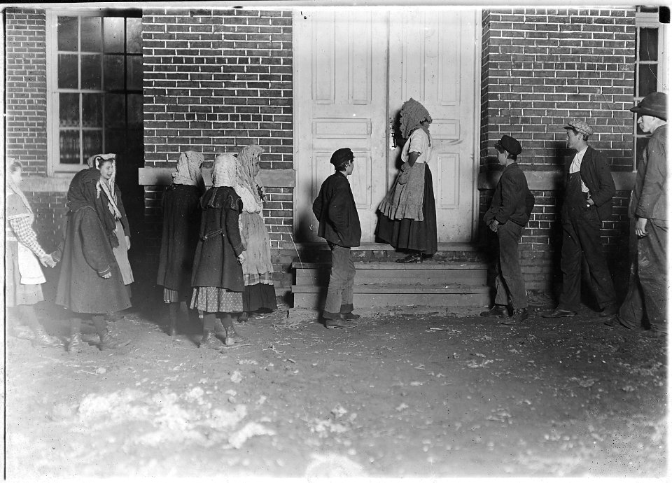Flashlight photo of children on night shift going to work at 6 P.M. on a cold, dark December day - NARA - 523139