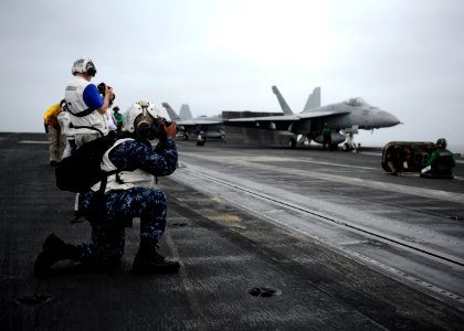 Flickr - Official U.S. Navy Imagery - A Chief photographs flight operations.