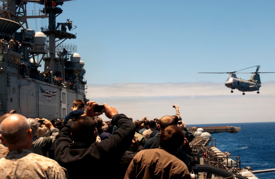 Flickr - Official U.S. Navy Imagery - A helicopter approaches the flight deck of USS Makin Island.