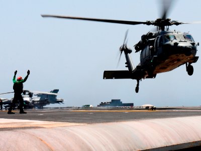 Flickr - Official U.S. Navy Imagery - A helicopter lifts off from the flight deck.