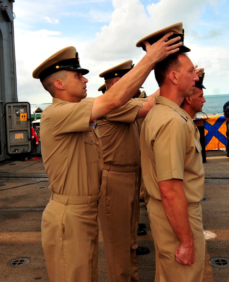 Flickr - Official U.S. Navy Imagery - A new chief receives his combination cover. (2)
