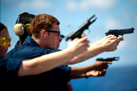 Flickr - Official U.S. Navy Imagery - A Sailor aims his 9 mm pistol.