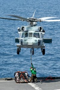 Flickr - Official U.S. Navy Imagery - A helicopter lifts supplies from the fantail