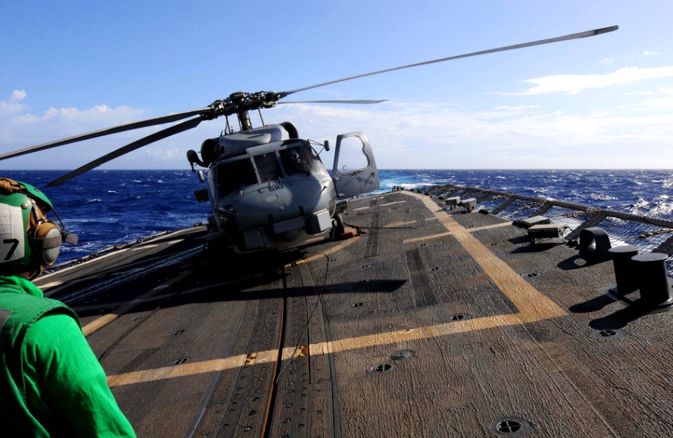 Flickr - Official U.S. Navy Imagery - A helicopter takes of from USS Underwood.