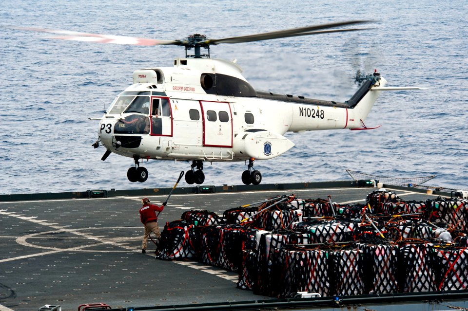 Flickr - Official U.S. Navy Imagery - A helicopter picks up supplies.