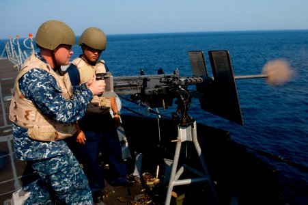 Flickr - Official U.S. Navy Imagery - A Sailor fires a .50 cal machine gun.