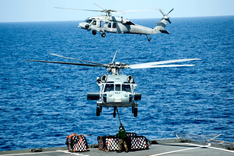 Flickr - Official U.S. Navy Imagery - A helicopter lifts supplies from the fantail. (1)