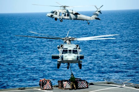 Flickr - Official U.S. Navy Imagery - A helicopter lifts supplies from the fantail. (1)