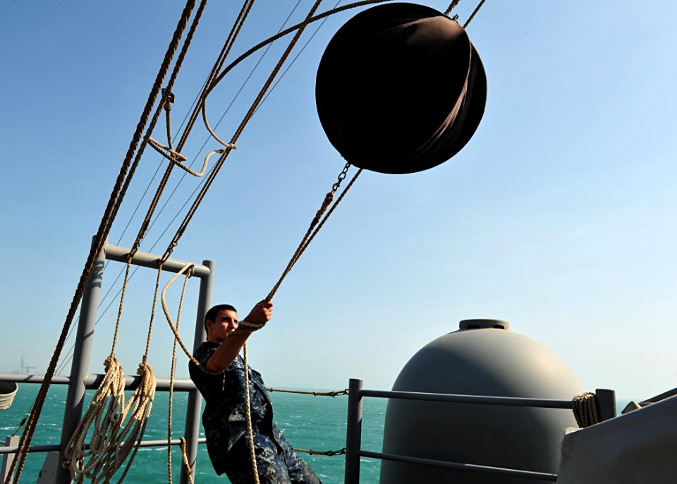 Flickr - Official U.S. Navy Imagery - A Sailor hauls up a Day Shape.