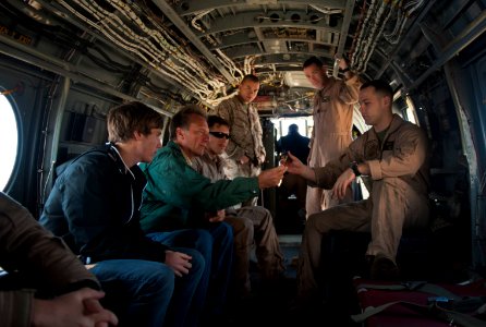Flickr - Official U.S. Navy Imagery - A Marine gives Tiger Cruise participants a tour.