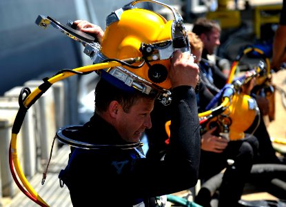 Flickr - Official U.S. Navy Imagery - A Navy diver prepares to perform underwater hull maintenance.
