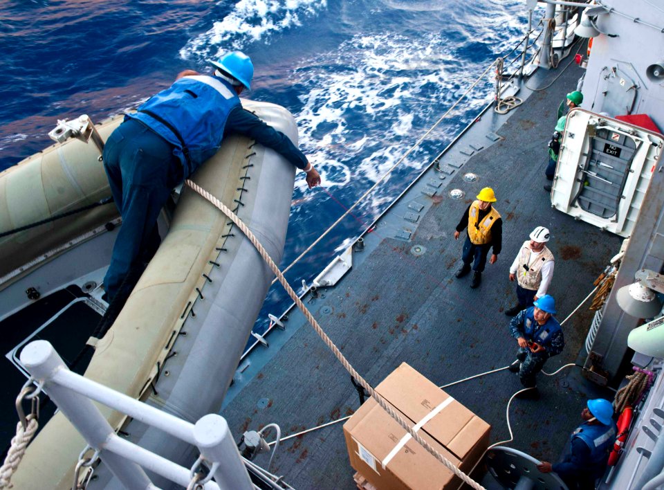 Flickr - Official U.S. Navy Imagery - A Sailor lowers a shotline.